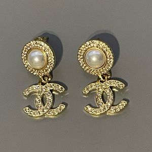 Chanel earrings never worn